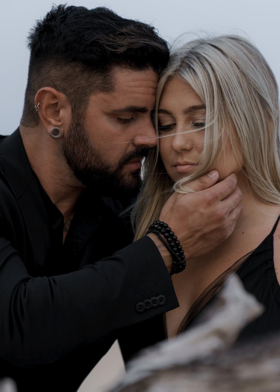 Jesse and Paige Vickers — tattoo artist and wife portrait in Grand Blanc Michigan