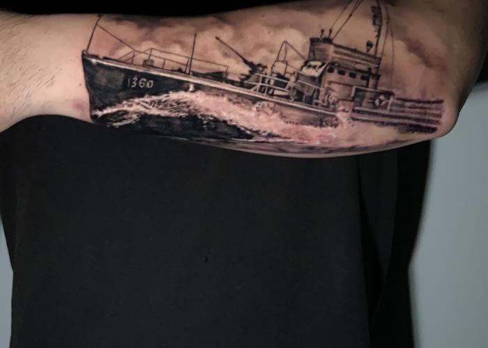 Black Ink Outline Navy Ship Tattoo On Full Back